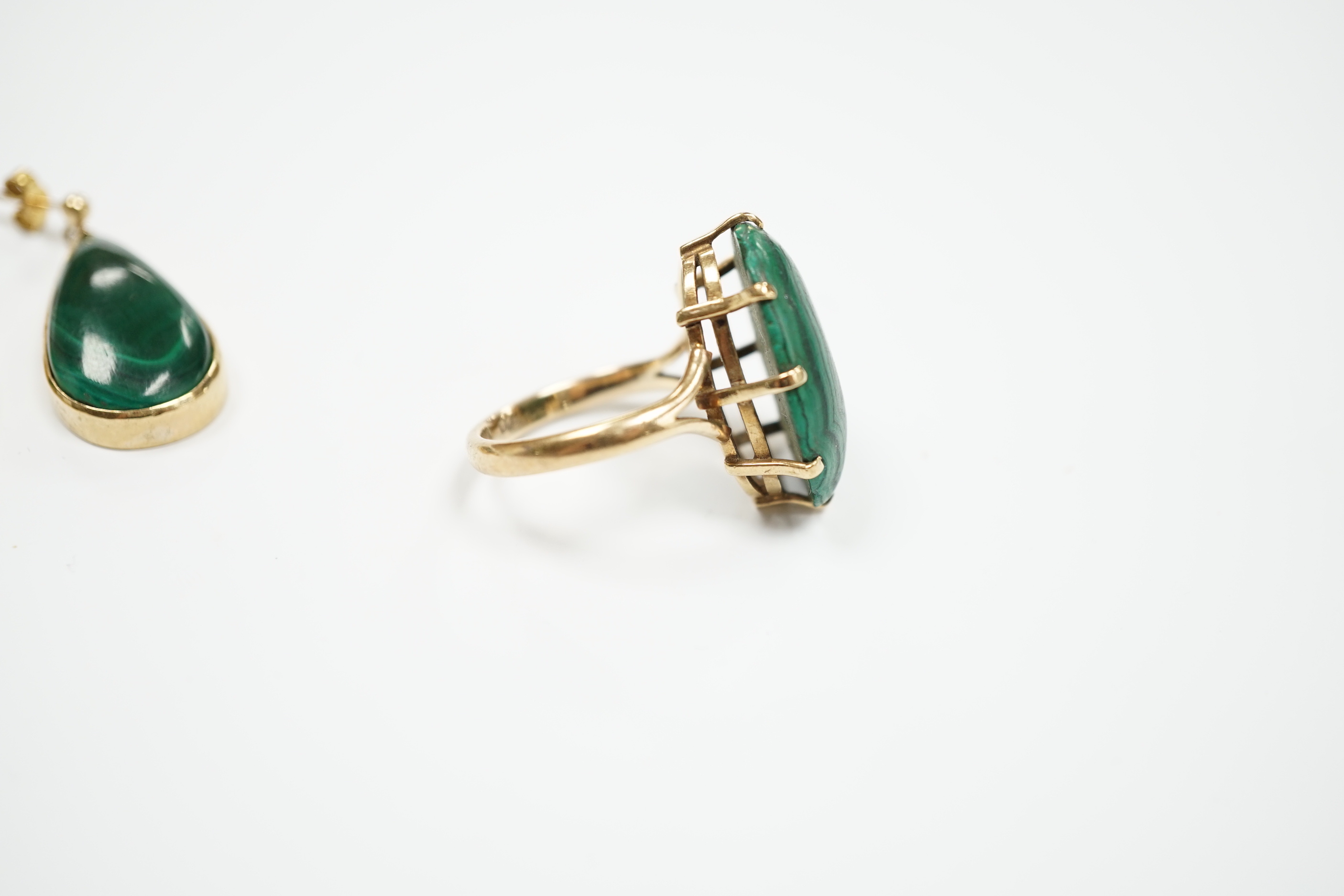 A 9ct and oval cut malachite set dress ring and pair of matching drop earrings, ring size P, gross weight 20.1 grams.